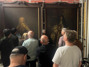History Group looking at historic Paintings