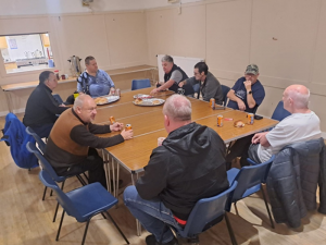 Men in discussion